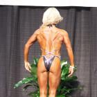 Kristi   Tauti  - IFBB Optimum Pro 2012 - #1